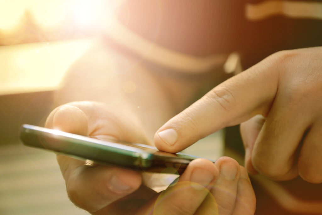 Person making a payment using a mobile online payment system