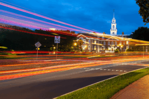 Municipal government building with light trails representing digital government payment solutions