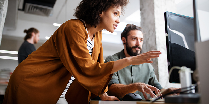 Team working on digital billing systems representing paperless billing and payment automation