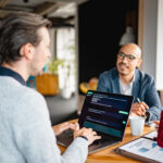 Person with a laptop trying to make payment using InvoiceCloud services